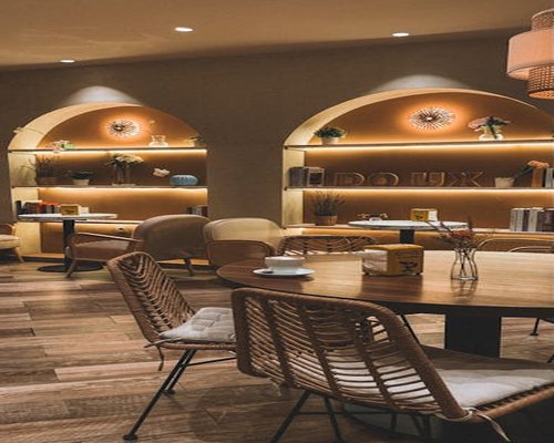 modern minimalist workspace with plants and soft lighting